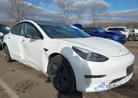 2021 Tesla Model 3 Standard Range Plus Rear-Wheel Drive from USA, damaged, VIN 5YJ3E1EA1MF016639